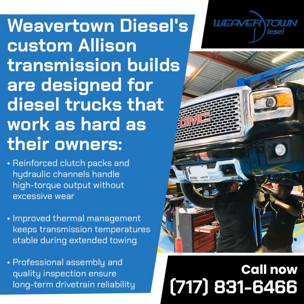 Technicians installing custom Allison transmission build on Duramax diesel truck for high torque and towing performance